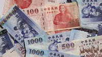 Taiwan’s Currency, Stocks Surge on Hopes of Better US-China Ties