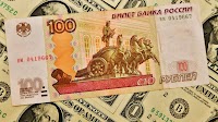 'Panic' in Russia as rouble slips to symbolic mark against US dollar