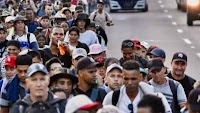 Hundreds of migrants mount protest in southern Mexico in bid to legalize status