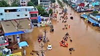 Andhra-Telangana Rains: Chandrababu Naidu Reviews Flood Situation Atop A JCB; Revanth Reddy Announces Rs 5 Cr Assistance