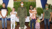 Army sponsors baptism of ex-rebels’ babies
