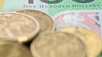 Australian dollar tumbles