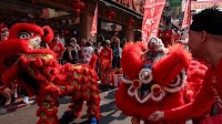 Who is celebrating the Chinese Lunar New Year of the Snake and how?