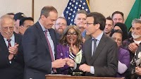 Ferguson breaks with past Washington governors — on his official bill-signing pens