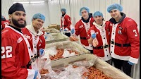 VIDEO: Surrey Eagles help fill holiday hampers at Brar brothers' farm