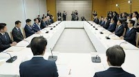 Japan gov't OKs 39 tril. yen economic package to ease inflation pain