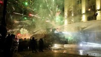 Georgian Lari Touches Two-Year Low After Clashes Between Police and Protestors