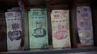 Mexican peso, stocks tumble on fears of ruling coalition super-majority in Congress