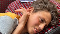 Shot by Israeli troops while getting aid, a boy in Gaza fights for his life
