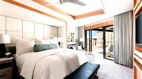 Is The Ritz-Carlton Grand Cayman Running A Currency Conversion Scam?