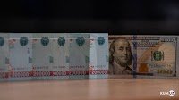 US dollar exchange rate falls below UZS 12,000 for the first time since August 2023