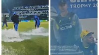 Pakistani groundstaff slips and falls trying to mop water from covers in AUS vs AFG match, Australia players bemused | Cricket