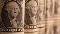 Dollar inches up against dong