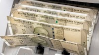Indian rupee hits record low against U.S. dollar amid Trump's tariff threats (USD:INR:null)