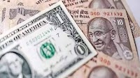 Rupee pares initial gains, settles 1 paisa higher at 84.53 against US dollar