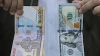Experts predict USD to reach up to 14,000 UZS by year-end