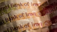 Iraq Pivots to Yuan for China Imports in Defense of Own Currency