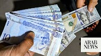 Libyans grapple with fresh currency devaluation