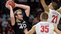 Xavier’s Matt Stainbrook is delightful, but Arizona’s T.J. McConnell is too good