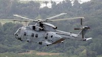 One dead after Royal Navy Merlin helicopter ditches in the Channel