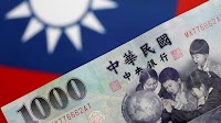 Taiwan dollar's record rally is a trade-war tremor