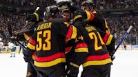Sherwood's late goal breaks tie in 3rd, Canucks defeat Wild
