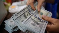 Dollar rises against dong