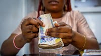 Next Africa: Godwin Emefiele Can’t Seem to Tame the Naira