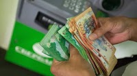 Kazakhstan Allows Tenge to Weaken Amid Oil Price Crash