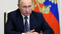 The International Criminal Court issues an arrest warrant for Putin