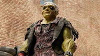 The Toxic Avenger remake poster shows that Toxie is ready to mop up evil