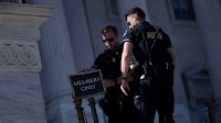 As they go unpaid, Capitol Police are a daily reminder for lawmakers of shutdown pain