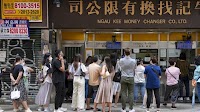 Weaker Hong Kong dollar to boost tourism and lower cost of services: economists
