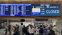 New HNL displays show security checkpoint status