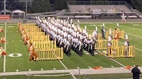 Galesburg High School marching band defeats 11 schools to become grand champions Saturday at Bloomington