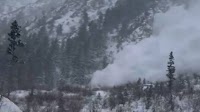 Moment avalanche slides down mountain in Utah