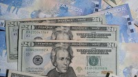 Canadian dollar hits 22-year low, US dollar surges after Donald Trump imposes tariffs on Canada, China, and Mexico