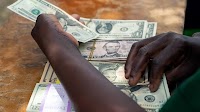 Zimbabwe’s Imara Sees U.S Dollar Surge Easing Out Forex Auction
