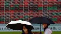 Asian shares rally, Aussie dollar hits 8-month high on trade optimism