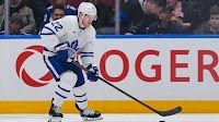 Rogers Communications stock sinks amid reports of NHL deal, analyst downgrade