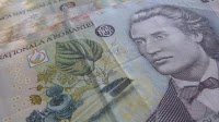 Romanian currency depreciates to 5 lei per euro