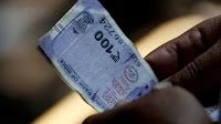 Weak Indian rupee may blunt US tariff bite, say economists
