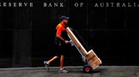 Australia set for first rate cut since 2020 as trade risks mount