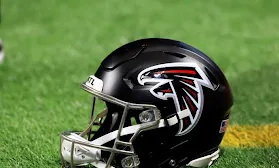 Falcons fire assistant DL coach LaTroy Lewis