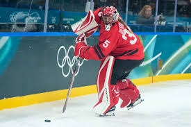 Winter Olympics changing ice hockey boards to lighter color after players' concerns