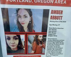 Imagen de worried family looking at a missing person's poster