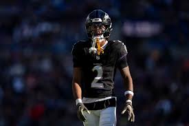 Ravens CB Nate Wiggins carted off with a left leg injury