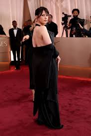 Mia Goth Wore a Backless Halter Gown to the 2026 Golden Globes