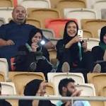 Saudi Arabia women attend football