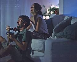 Image of Couple watching movies at home